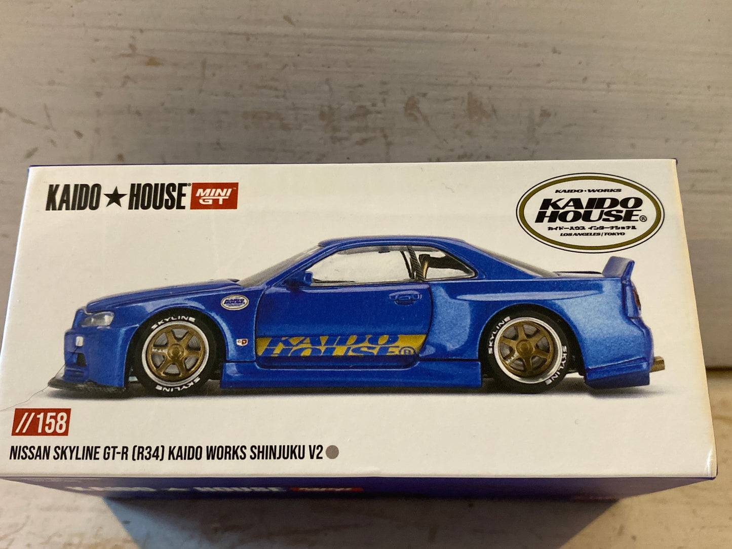 Kaido House MiniGT - //158 Nissan Skyline GT-R (R34) Kaido Works Shinjuku V2