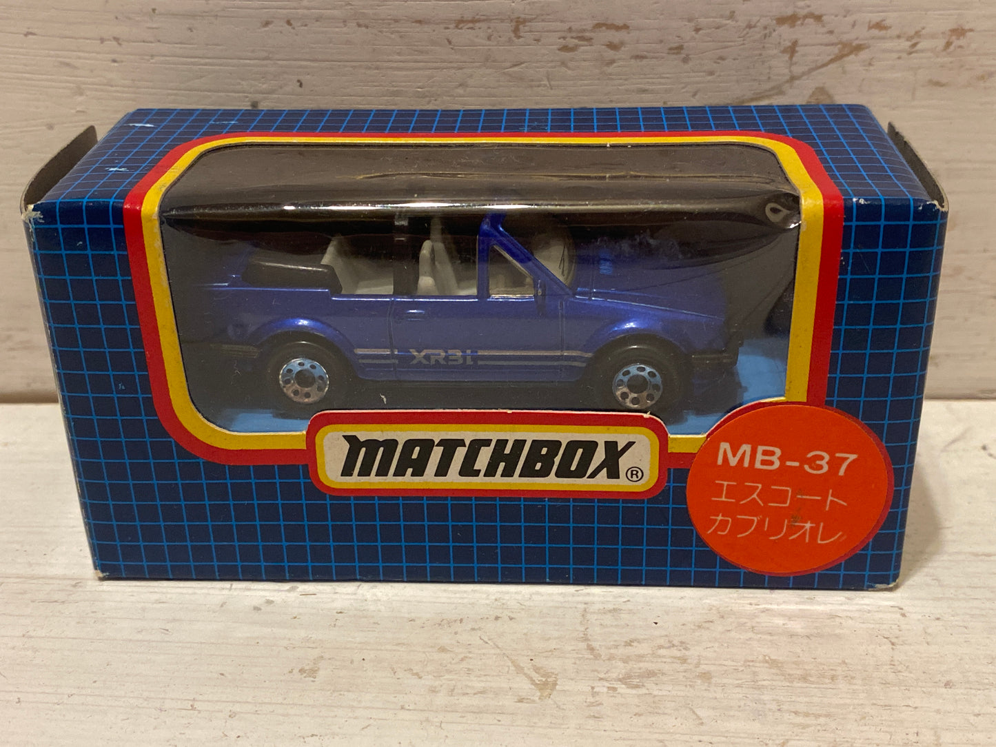 Matchbox Ford Escort XR3i Convertible- Blue in rare Japanese Blue Grid Window Box