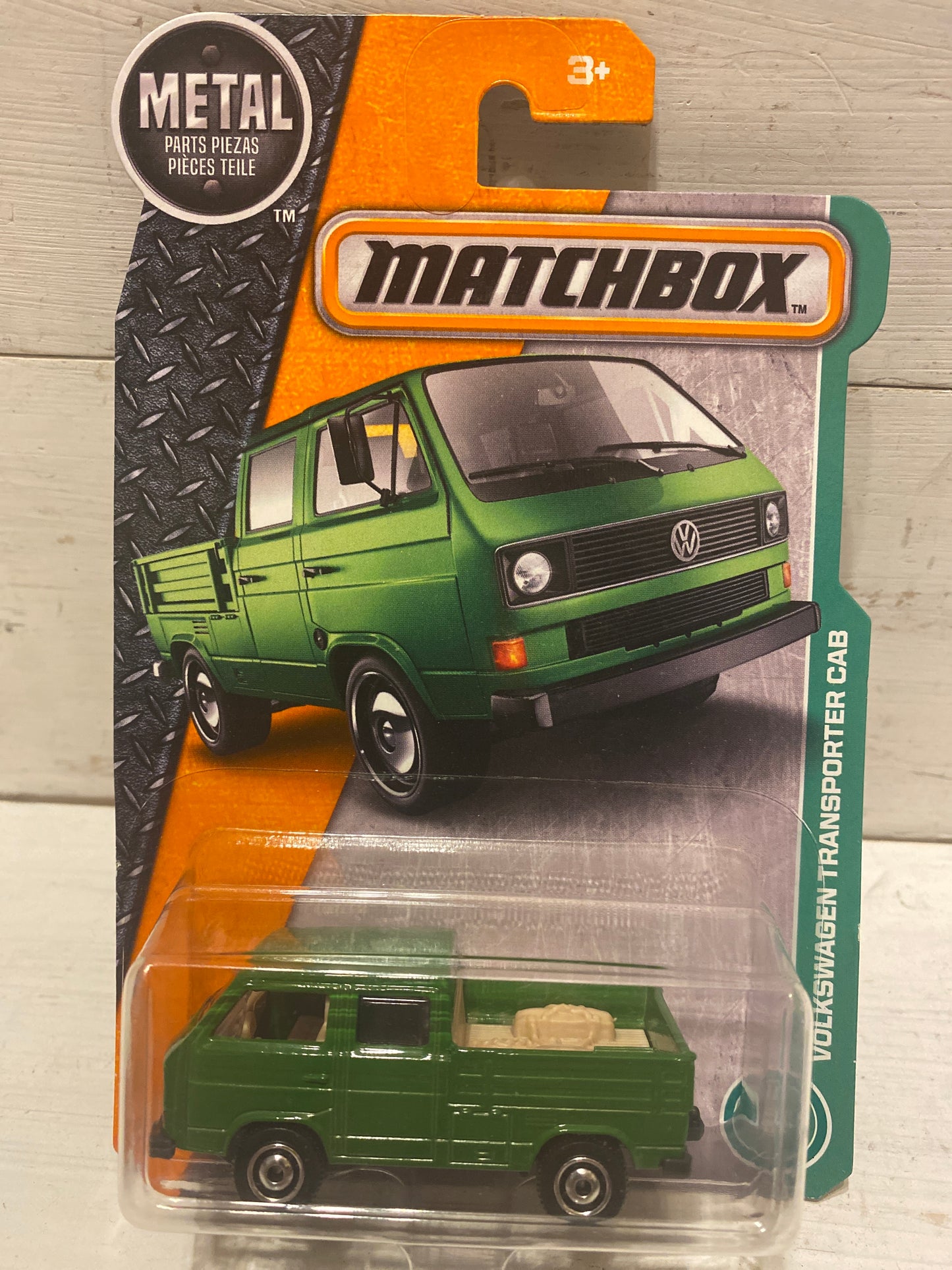 Matchbox Volkswagen Transporter Cab - Green with load in rear.