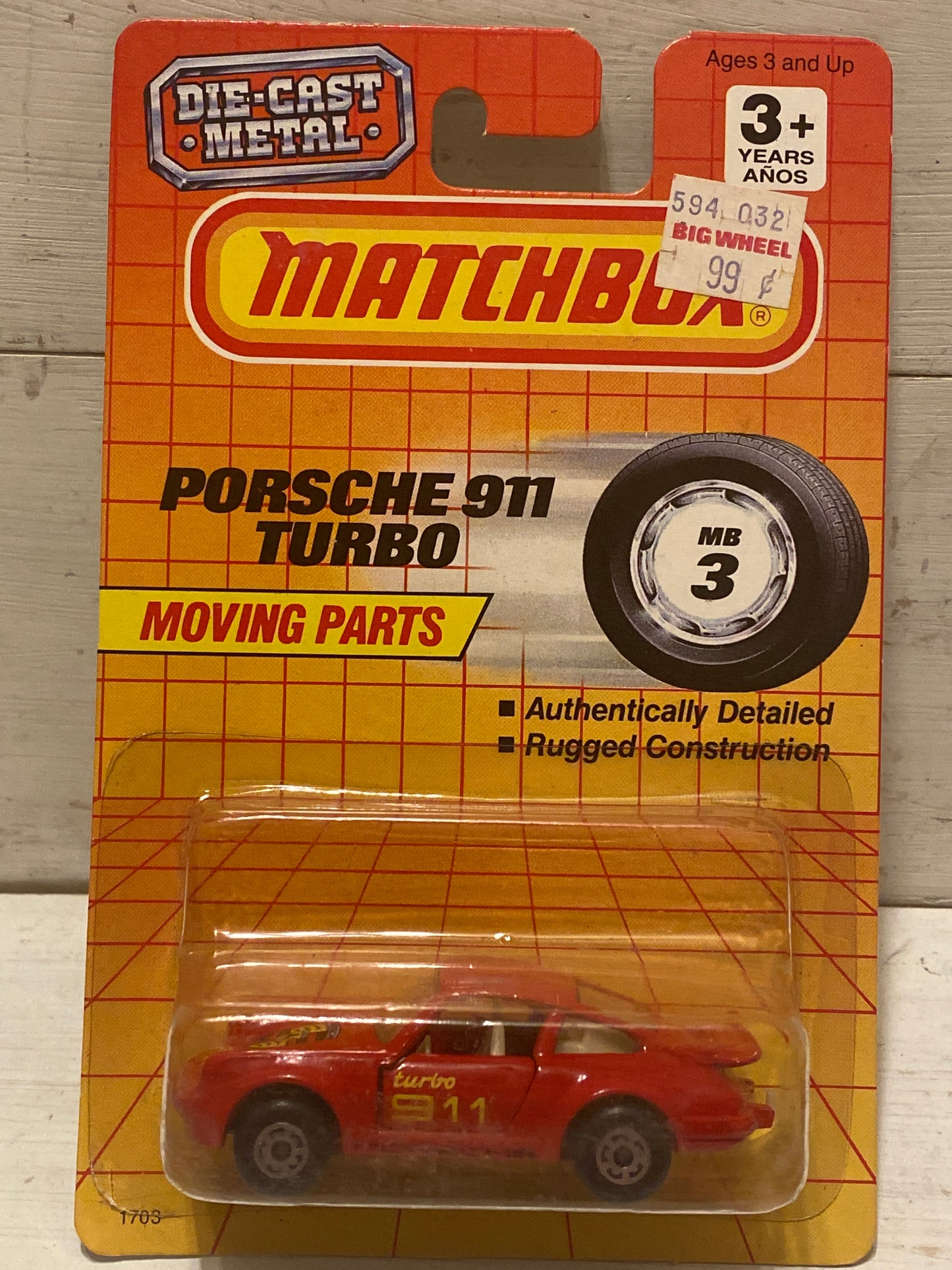 Matchbox Porsche 911 Turbo - Red with shield on US Yellow Grid card