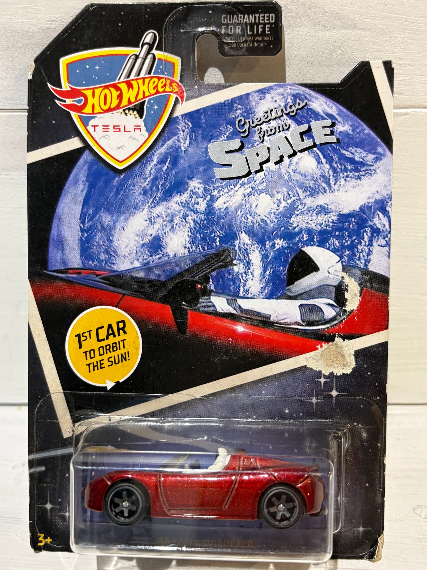 Hot Wheels - ‘08 Tesla Roadster - Greetings from Space (with Astronaut Driver)
