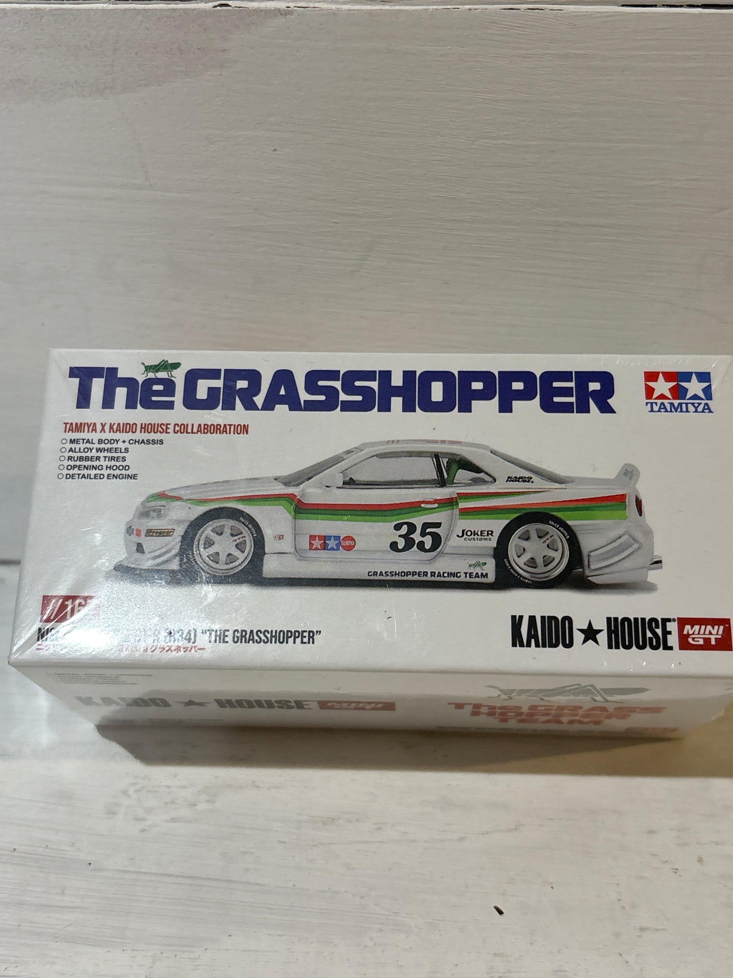 Kaido House MiniGT - //167 Nissan Skyline GT-R (R34) ‘The Grasshopper’ Tamiya Collaboration