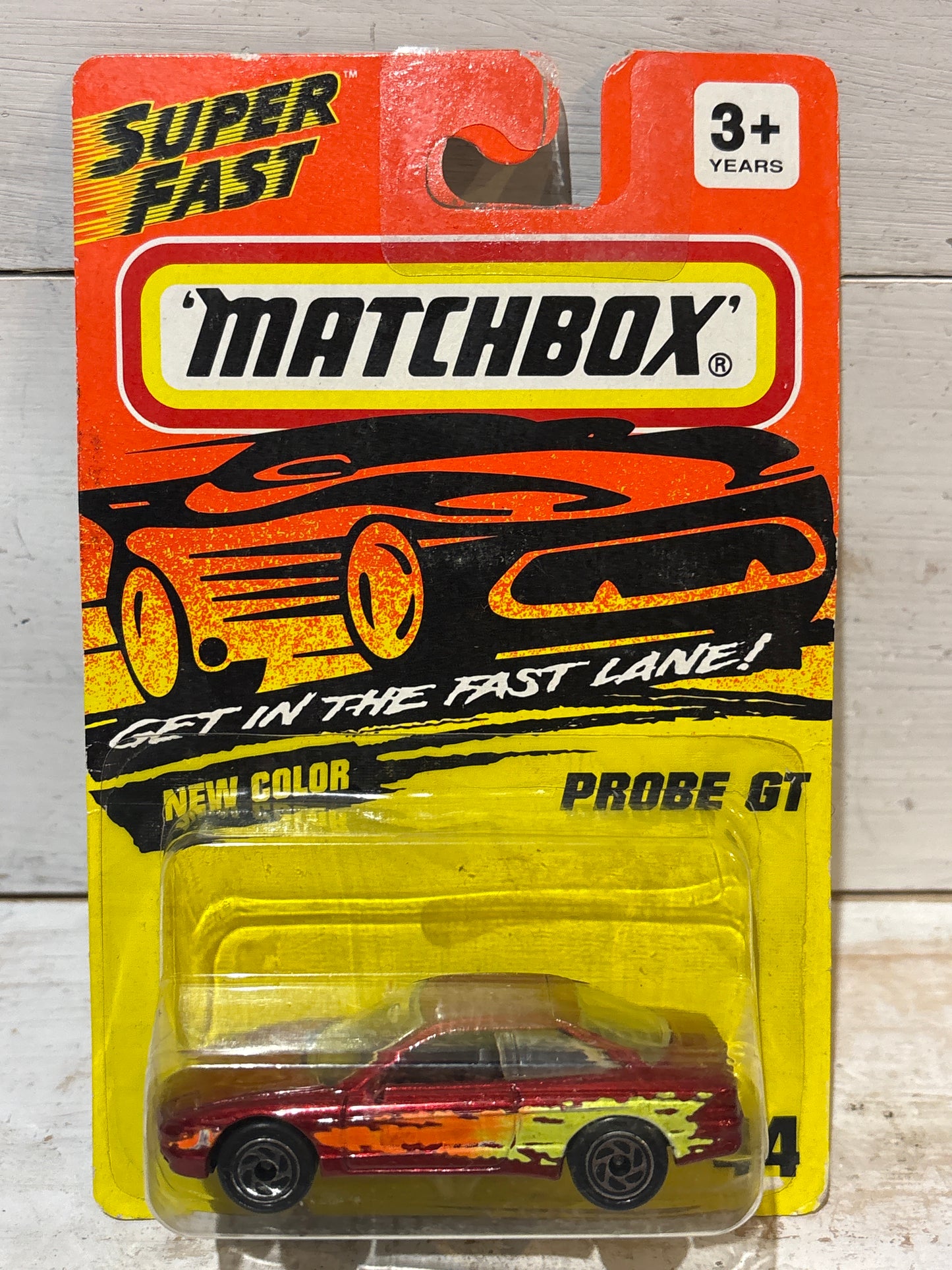 Matchbox - Ford Probe GT - Metallic Red with Orange & Yellow Tampo