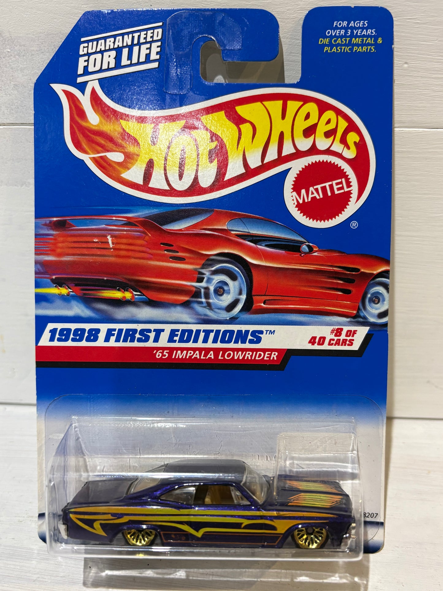 Hot Wheels - ‘65 Impala Lowrider - 1998 First Editions - Purple - Red Car on Card Variation